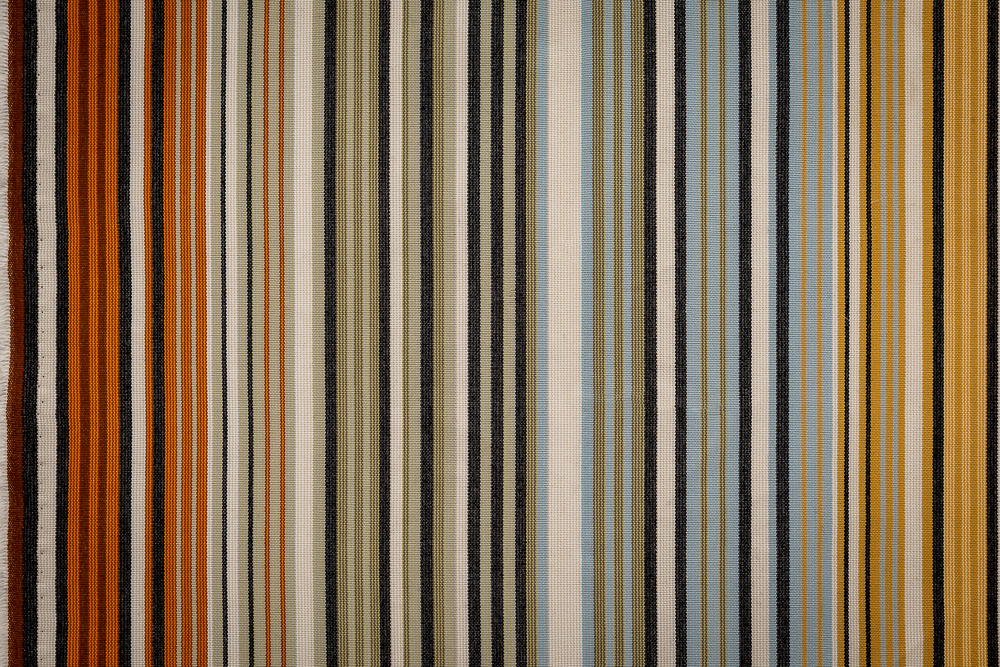 Pattern play. From geometric floors to woven stripes, the mid-century theme is starting to find its rhythm.