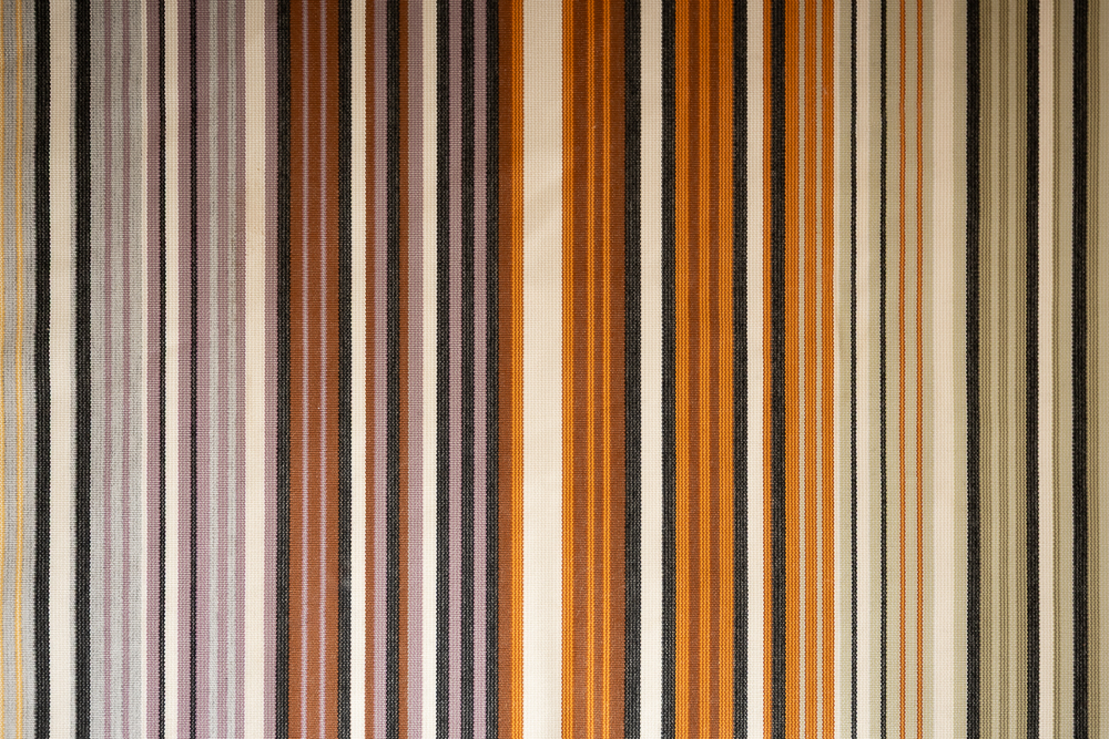 Pattern play. From geometric floors to woven stripes, the mid-century theme is starting to find its rhythm.
