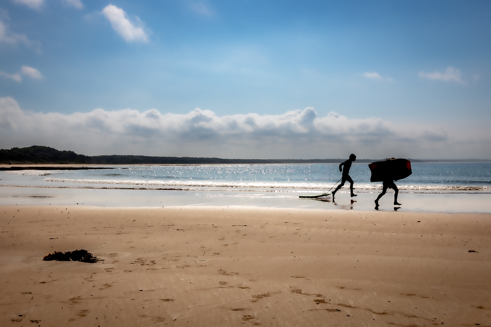 Children playing in the surf at Currarong Beach. 